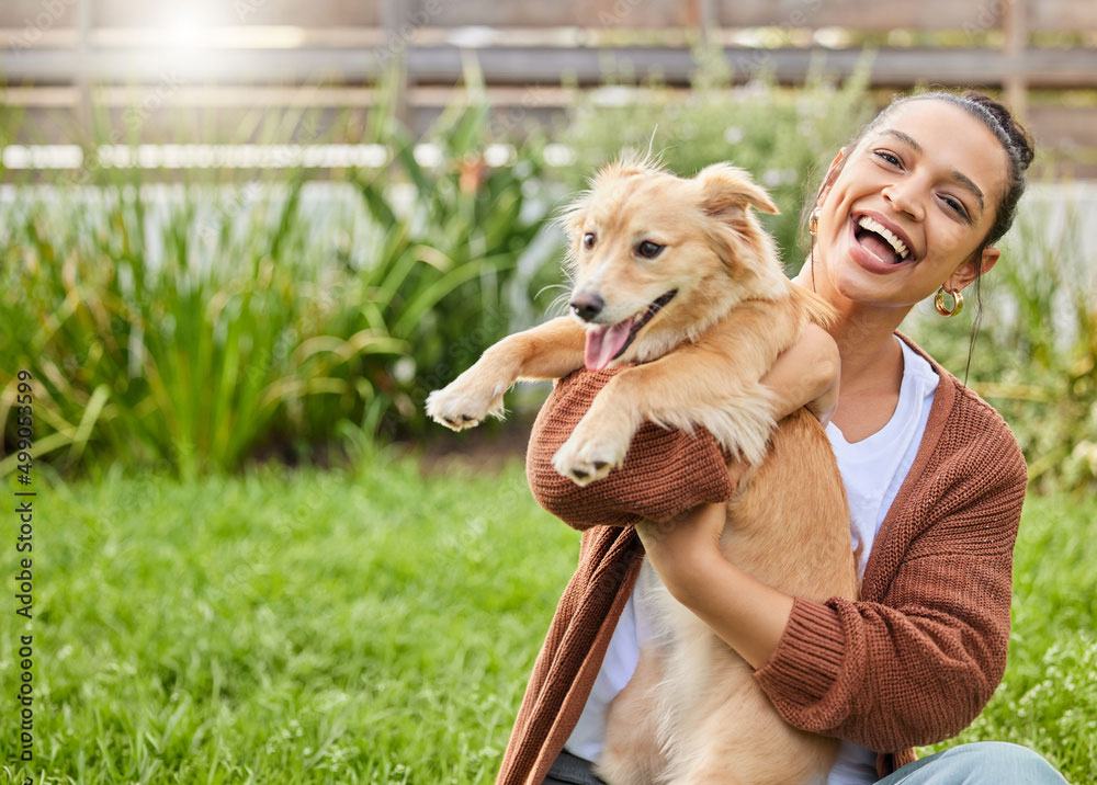 Volunteer holding a rescued dog